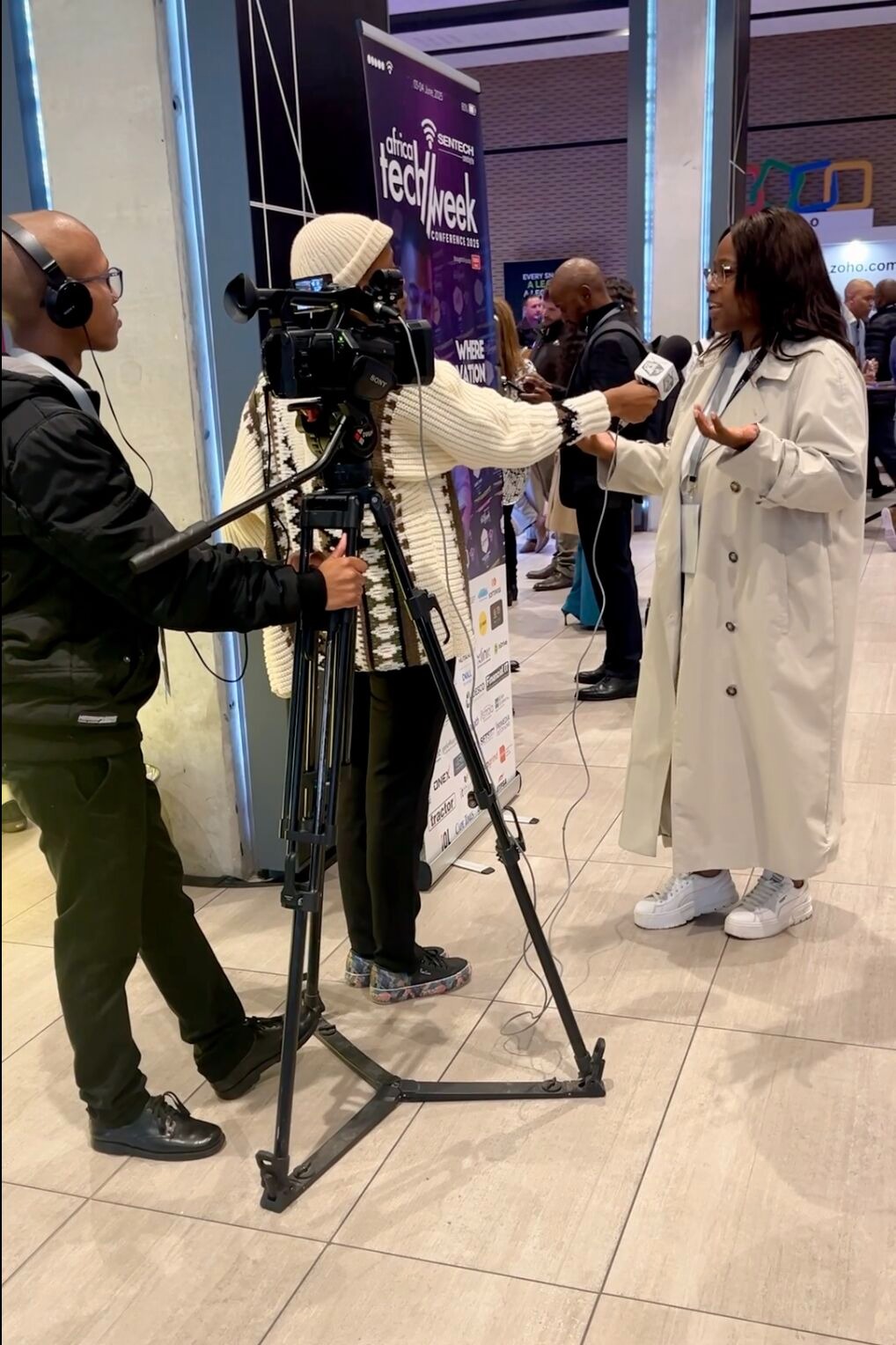 Ntsiki Sackey being interviewed on camera at Africa Tech Week